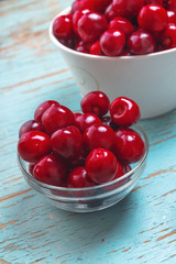 Sweet Cherry in Bowl on Rustic Table