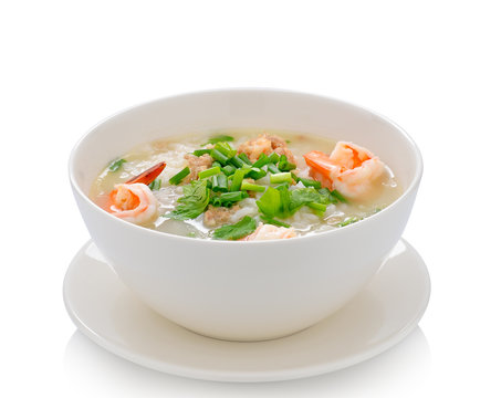 Boiled rice with shrimp on white background
