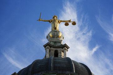Fototapeta na wymiar Justice Statue On The Old Bailey, London