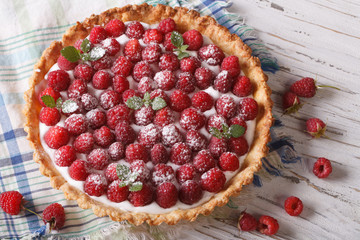 raspberry tart with cream cheese and mint closeup. horizontal 