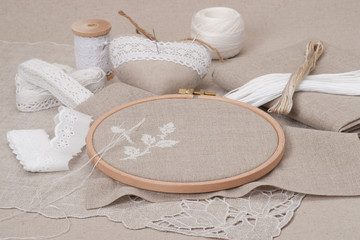 Sewing And Embroidery Craft Kit. Natural Linen Background