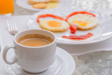 hot Coffee with Happy Face Frying Eggs breakfast