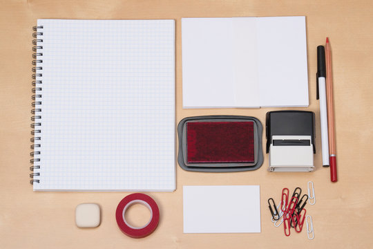 Business Identity Mockup Item Set On Wooden Desk