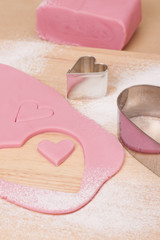 Pink Icing Sugar On Wooden Board