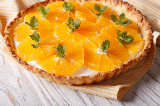 Orange tart with a delicious cream close-up horizontal
