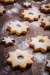 Fototapeta na wymiar Homemade Christmas cookies in star shape