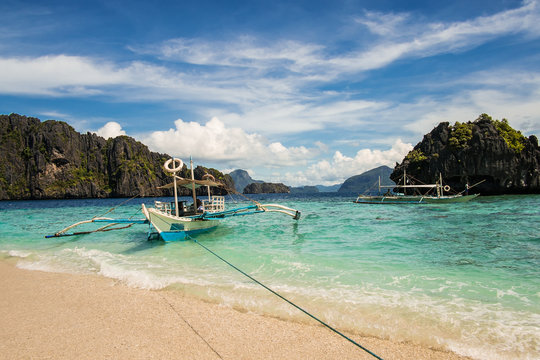 Seaview with the rocks and pump boats near El Nido. Palawan, Philippines.