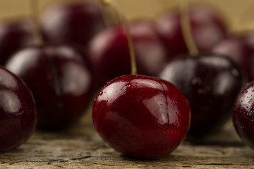 fresh ripe cherry on wooden background