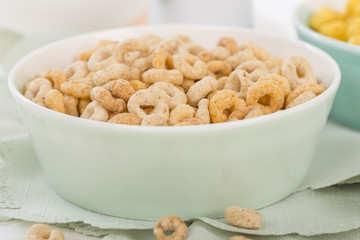 Cheerios - Bowl with cheerios whole grain cereals.
