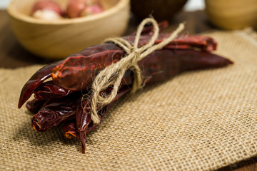 Dried chili on wooden table top