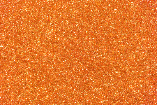 Details 100 orange glitter background