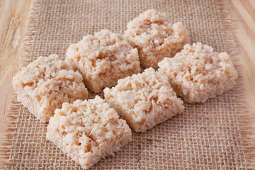 Coconut candy cocada on sackcloth