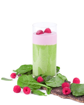 Green Smoothie With Raspberries On White Background