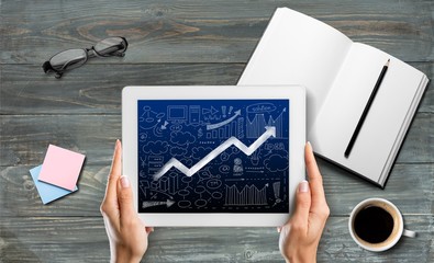 Tablet, hand, phone.