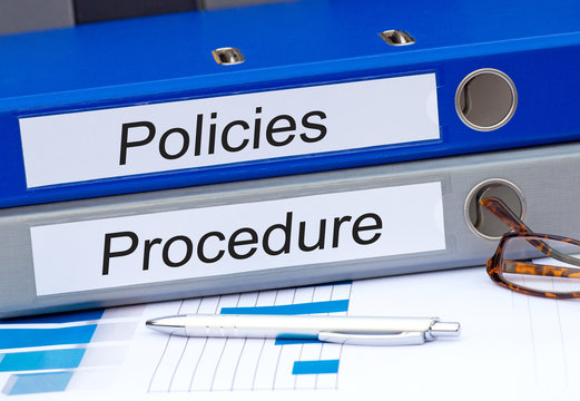 Policies And Procedure - Two Binders In The Office