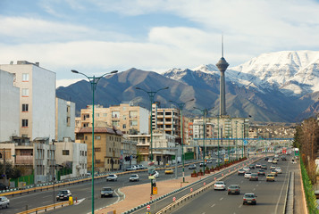Street View of Tehran with Milad Tower and Alborz Mountains