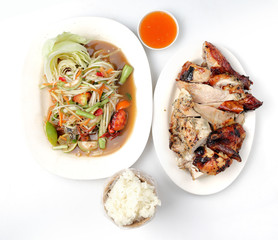 Grilled chicken salad, sticky rice on white background.
