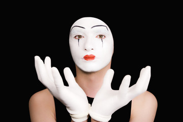Portrait of  mime in white gloves