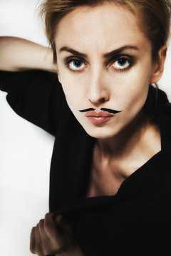 beautiful young woman with  painted mustache