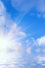 sky and the sun reflected in water