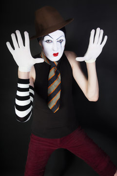 Funny mime on a black background