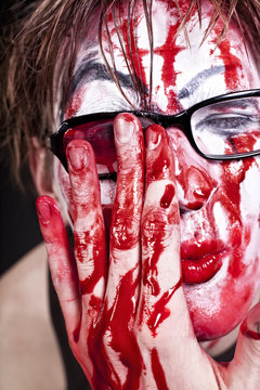 mime in glasses with blood