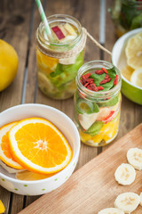 Fresh cutted fruit in jar