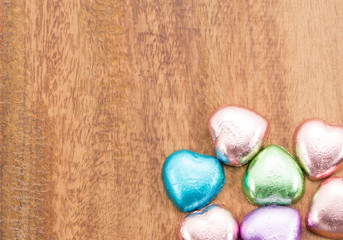 Chocolate heart on wooden background