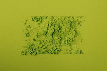 Monochrome de poudre de maquillage fard à paupières vert sur fond vert
