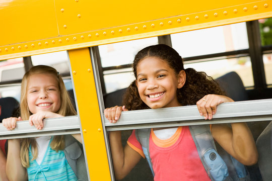 School Bus: Girls Looking Out Bus Window