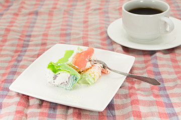Rainbow layer cake and coffee