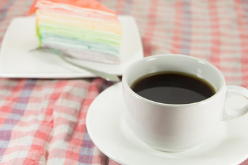 Rainbow layer cake and coffee
