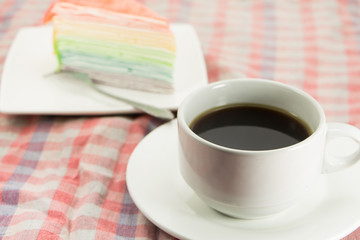 Rainbow layer cake and coffee