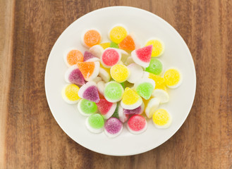 colorful jelly candies on wood