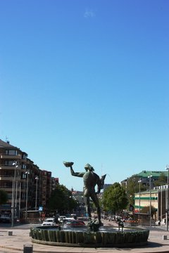 Götaplatsen, Kungsportsavenyen and  Poseidon Statue Fountain in Gothenburg under blue sky, Sweden