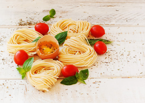 raw egg and noodles with spices
