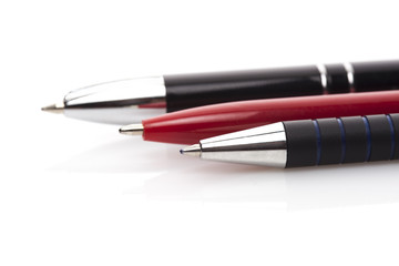 Three colored pens isolated on white background 