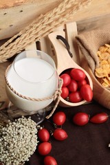 corn flake and milk with fresh cherry tomatoes.