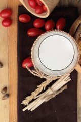 corn flake and milk with fresh cherry tomatoes.
