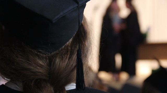 POV of young woman graduating, students receiving diplomas, successful career