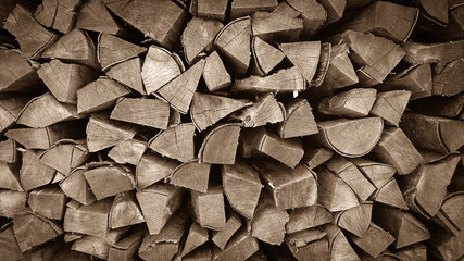 Neatly stacked wood as background