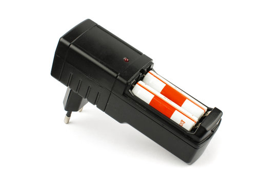 Black AA batteries charger isolated on the white background