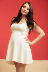 pregnant woman touching her belly