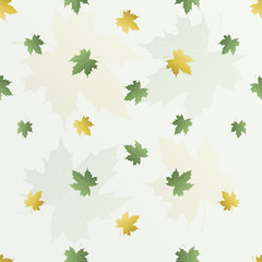 Зеленые и желтые падающие листья