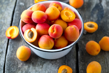 apricots on wooden surface