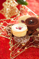 chocolate tartlets in festive golden red style
