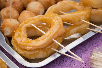 closeup of a pile of  typical  donuts