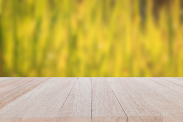 Top wooden table on blur and bokeh background