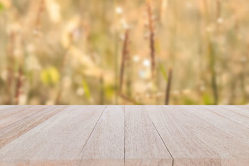 Top wooden table on blur and bokeh background