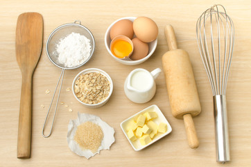 Food ingredient and recipe for baking (cake,dessert,sweet,),kitchen utensil and tool on wooden background